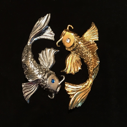 silver and gold koi circling car badge are easy to apply and remove