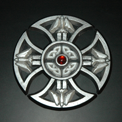 silver dover cross with red gem is a car badge that was designed by car jewel